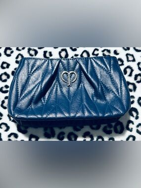 NWOT Cle De Peau Navy Quilted Luxury Cosmetic Pouch with Gold Logo